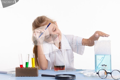 Image of Trainee pleased with the result obtained in chemistry class