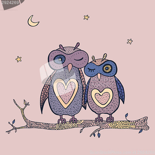 Image of Two cute decorative owls.