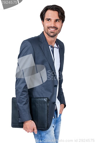 Image of Handsome stylish man carrying a briefcase