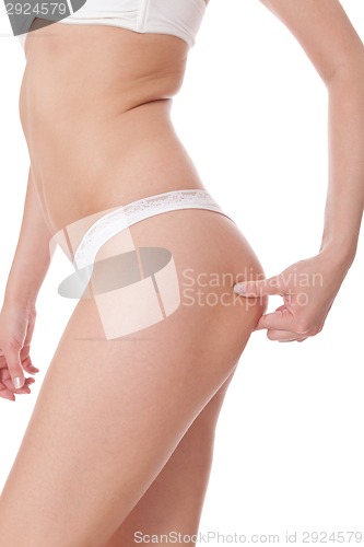 Image of Shapely slender woman posing in lingerie