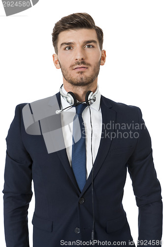 Image of Man wearing headset with stereo headphones