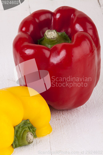 Image of Red and Yellow Peppers on White Background