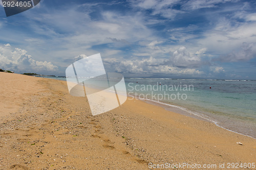 Image of Beautiful tropical beach with lush vegetation