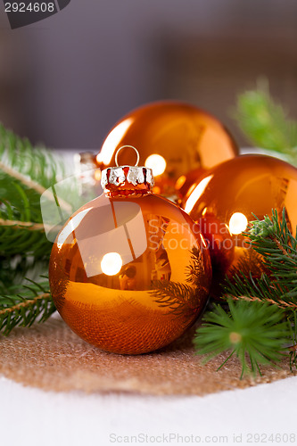 Image of Shiny bright copper colored Christmas balls