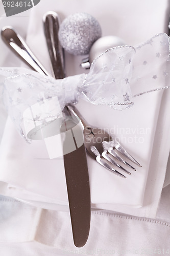 Image of Stylish blue and silver Christmas table setting