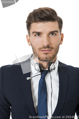 Image of Man wearing headset with stereo headphones