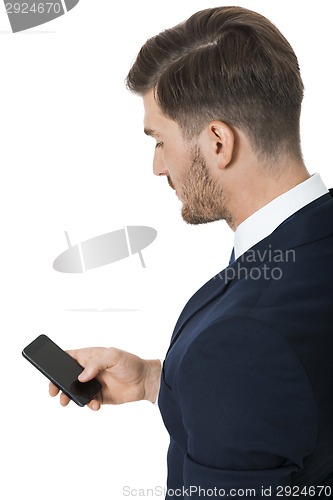 Image of Stylish businessman chatting on his mobile