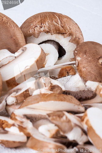 Image of Diced and whole agaricus brown button mushrooms