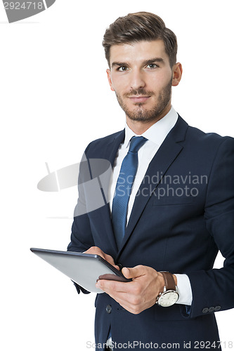 Image of Businessman using a tablet computer