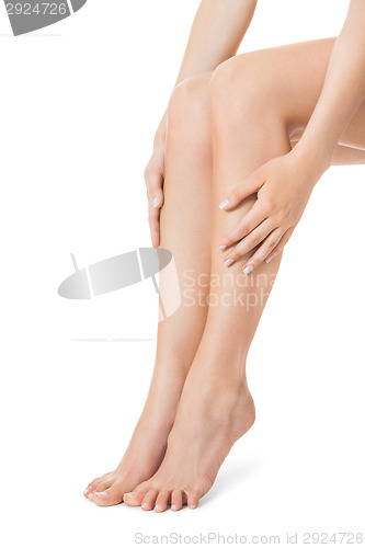 Image of Elegant long bare female legs