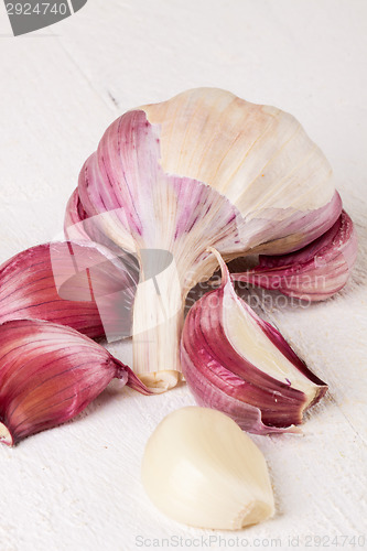 Image of Fresh garlic bulb with loose cloves