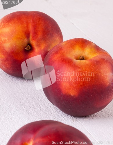 Image of Three tasty fresh ripe juicy nectarines