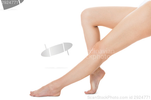 Image of Elegant long bare female legs