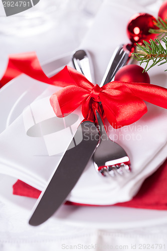 Image of Romantic red Christmas table setting