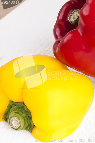 Image of Red and Yellow Peppers on White Background