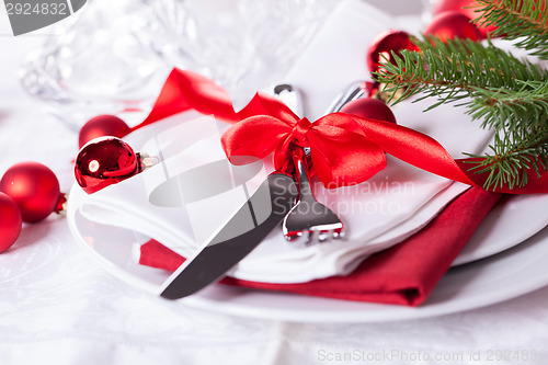 Image of Romantic red Christmas table setting