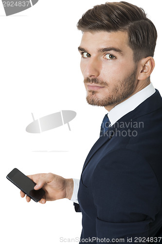 Image of Stylish businessman chatting on his mobile