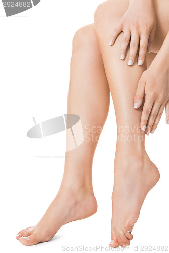 Image of Elegant long bare female legs