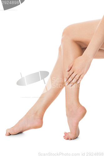 Image of Elegant long bare female legs