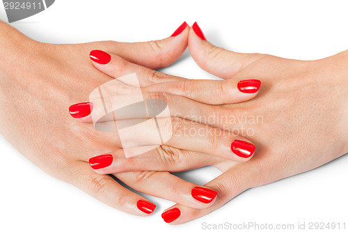 Image of Woman with beautiful manicured red fingernails