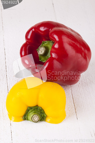 Image of Red and Yellow Peppers on White Background