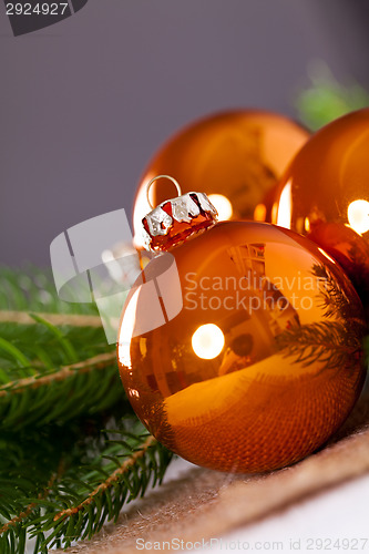 Image of Shiny bright copper colored Christmas balls