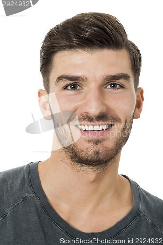 Image of Handsome bearded young man with a lovely smile