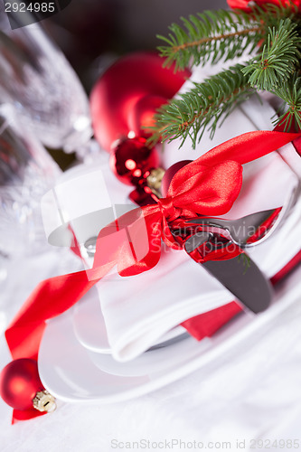 Image of Romantic red Christmas table setting