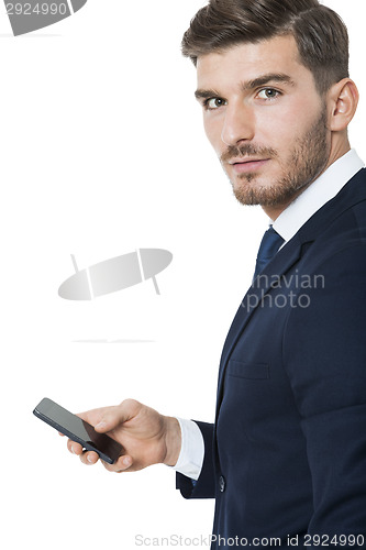 Image of Stylish businessman chatting on his mobile