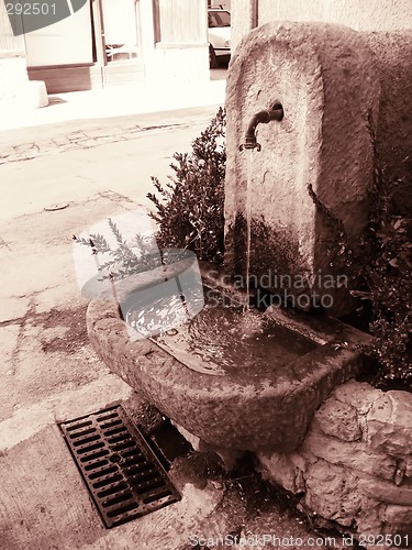 Image of old fountain in a provence village