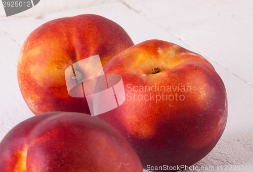 Image of Three tasty fresh ripe juicy nectarines