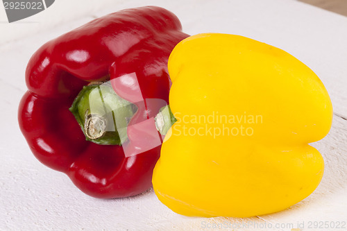 Image of Red and Yellow Peppers on White Background