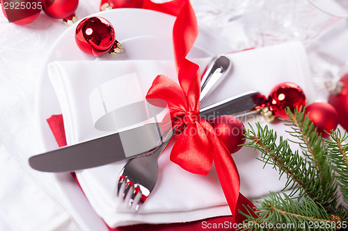 Image of Romantic red Christmas table setting