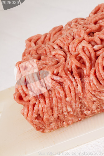 Image of Block of commercial beef mince from a store
