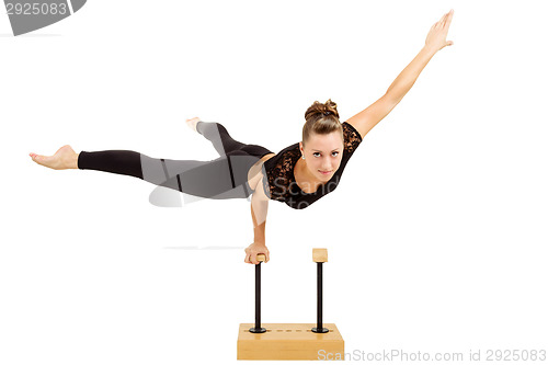 Image of Young professional gymnast woman