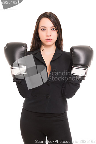 Image of Young brunette wearing boxing gloves