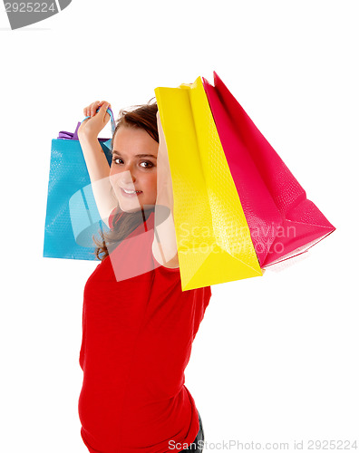 Image of Girl lifting shopping bag's.