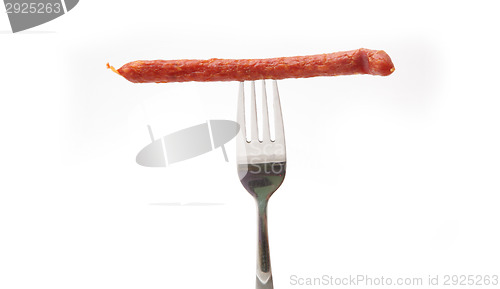 Image of sausage on a fork