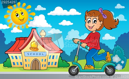 Image of Girl on push scooter near school