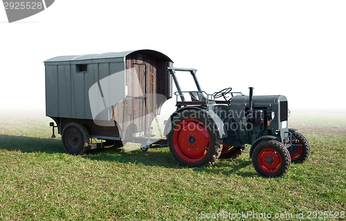 Image of historic tractor with trailer