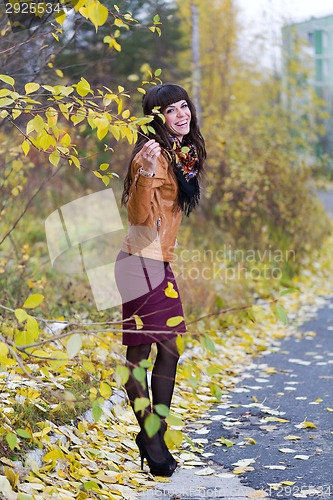 Image of girl in the autumn forest