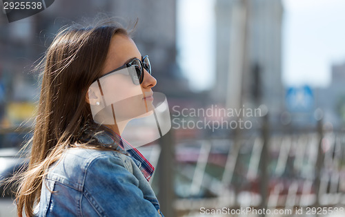 Image of Portrait in profile of a beautiful young girl.