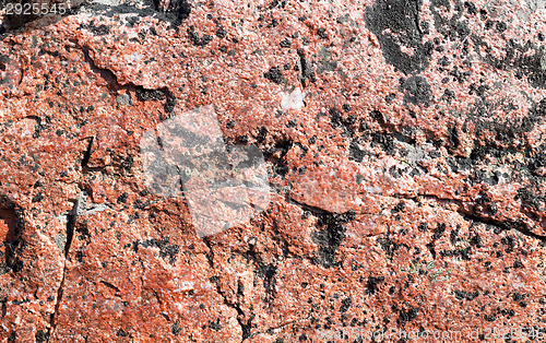 Image of background of red granite stone 
