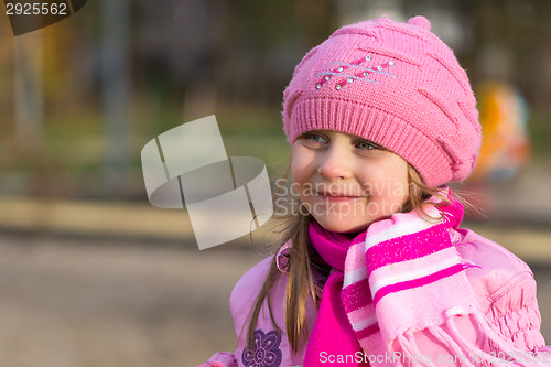 Image of portrait of a little girl in a pink hat