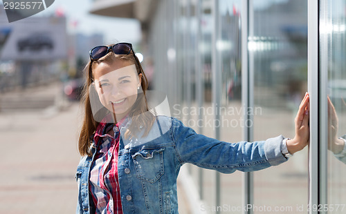 Image of portrait of a girl on a city street
