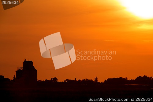 Image of Sunset Sillouette with Grain Elevator