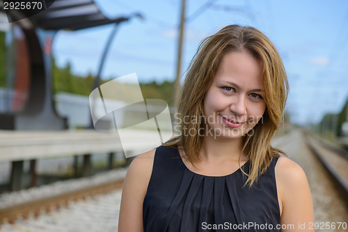 Image of Portrait of girl near railway station