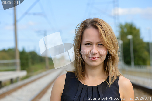 Image of Portrait of girl near railway path