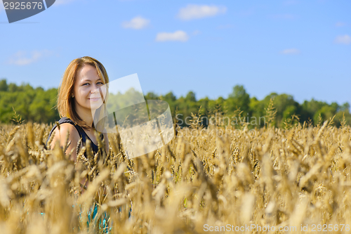 Image of Portrait of woman in field