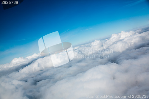 Image of bird's-eye view blue sky with clouds